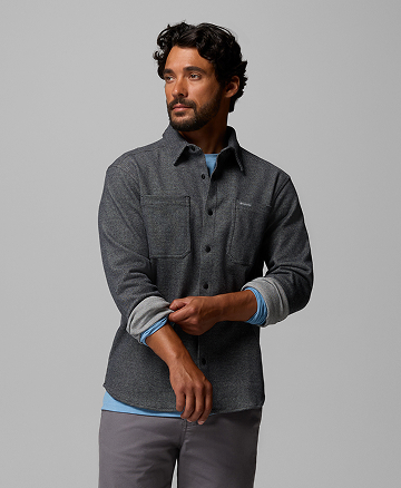 Man in a grey long sleeve shirt