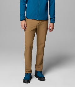 Waist-down image of a man wearing brown pants.