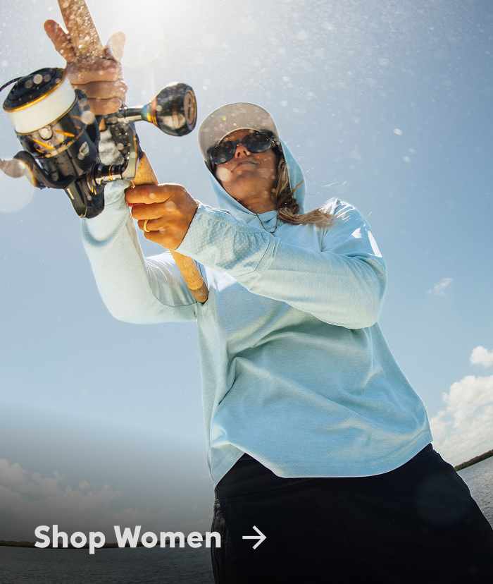 Shop Women. A close up of a woman angling. 