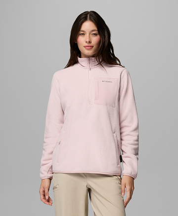Woman in a pink half zip