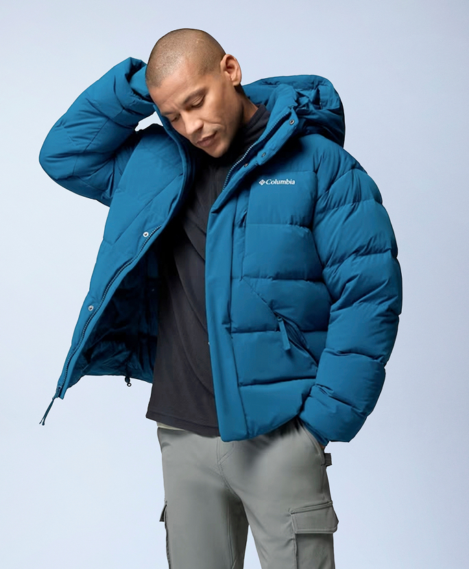 A man wearing a bright blue puffer.