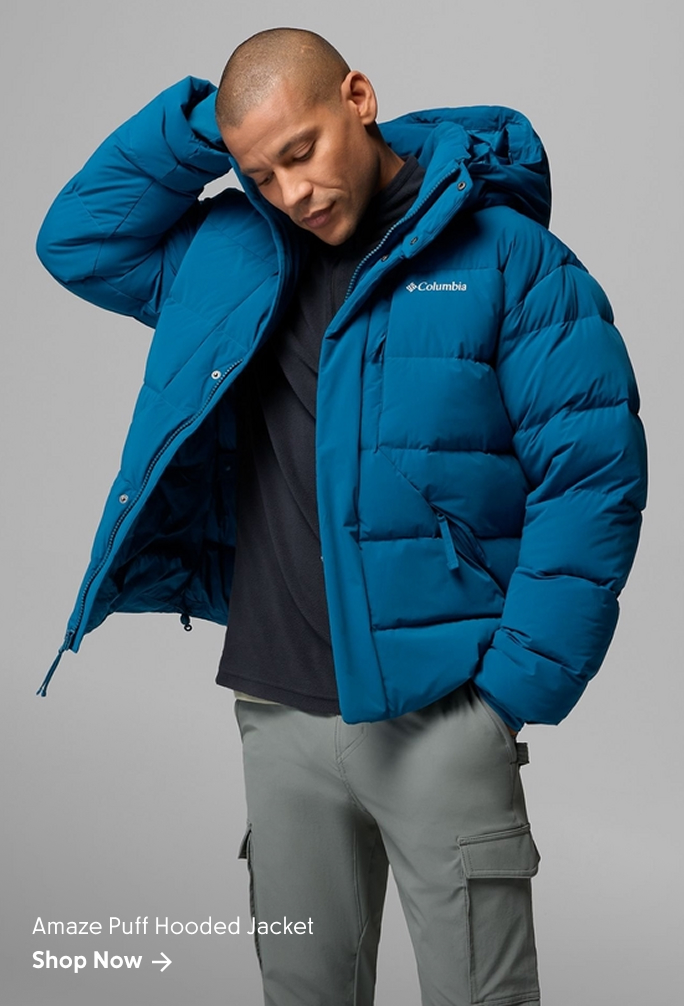 A man wearing a blue puffer jacket against a gray background with text: Amaze Puff Hooded Jacket